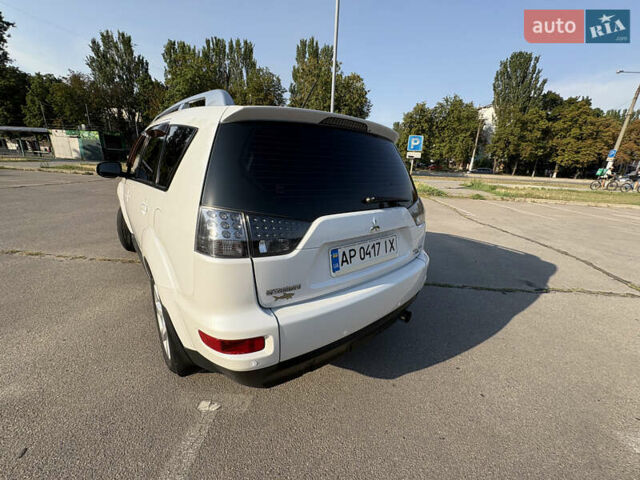 Белый Мицубиси Аутлендер ХЛ, объемом двигателя 2.36 л и пробегом 155 тыс. км за 10950 $, фото 70 на Automoto.ua