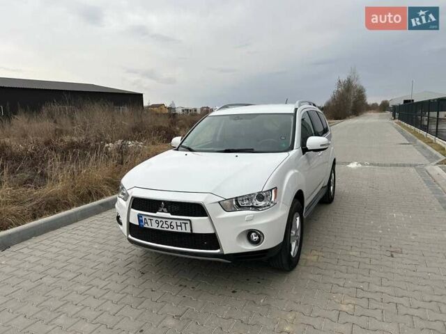 Білий Міцубісі Аутлендер ХЛ, об'ємом двигуна 2.2 л та пробігом 225 тис. км за 10999 $, фото 5 на Automoto.ua