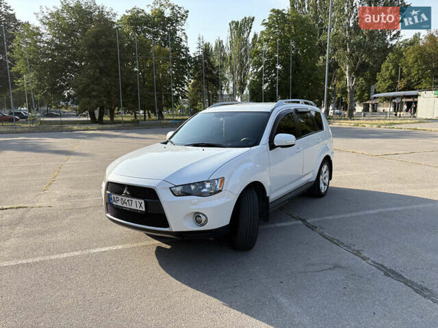 Белый Мицубиси Аутлендер ХЛ, объемом двигателя 2.36 л и пробегом 155 тыс. км за 10950 $, фото 81 на Automoto.ua