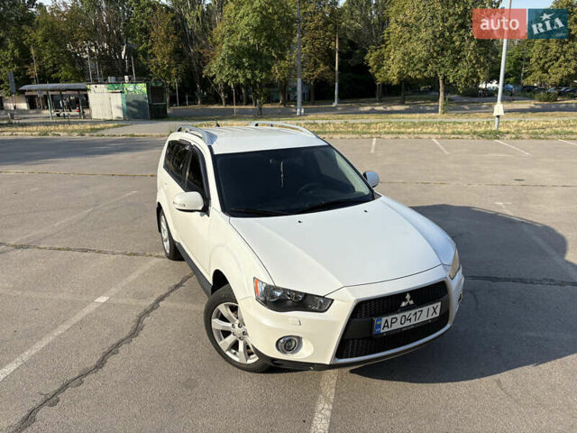Белый Мицубиси Аутлендер ХЛ, объемом двигателя 2.36 л и пробегом 155 тыс. км за 10950 $, фото 78 на Automoto.ua