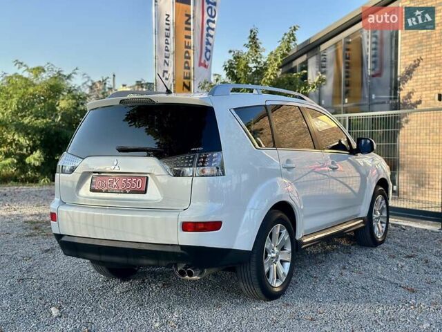 Мицубиси Аутлендер ХЛ 2011 в Виннице на Automoto.ua Белый Мицубиси Аутлендер ХЛ, объемом двигателя 2 л и пробегом 225 тыс. км за 10999 $, фото 13 на Automoto.ua