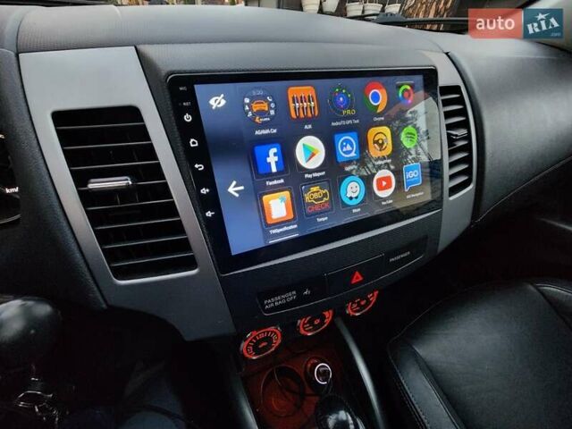 Білий Міцубісі Аутлендер ХЛ, об'ємом двигуна 2.36 л та пробігом 124 тис. км за 11300 $, фото 29 на Automoto.ua