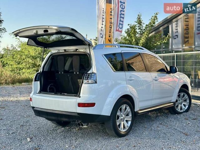 Мицубиси Аутлендер ХЛ 2011 в Виннице на Automoto.ua Белый Мицубиси Аутлендер ХЛ, объемом двигателя 2 л и пробегом 225 тыс. км за 10999 $, фото 22 на Automoto.ua