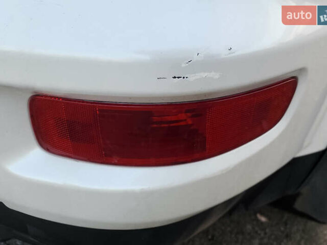 Білий Міцубісі Аутлендер ХЛ, об'ємом двигуна 2.36 л та пробігом 124 тис. км за 11300 $, фото 33 на Automoto.ua