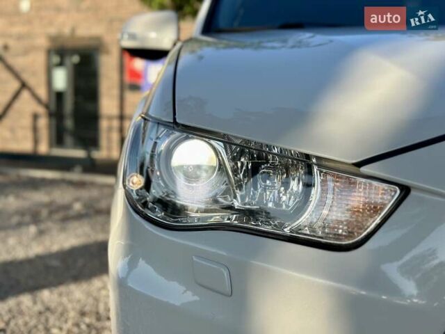 Мицубиси Аутлендер ХЛ 2011 в Виннице на Automoto.ua Белый Мицубиси Аутлендер ХЛ, объемом двигателя 2 л и пробегом 225 тыс. км за 10999 $, фото 5 на Automoto.ua