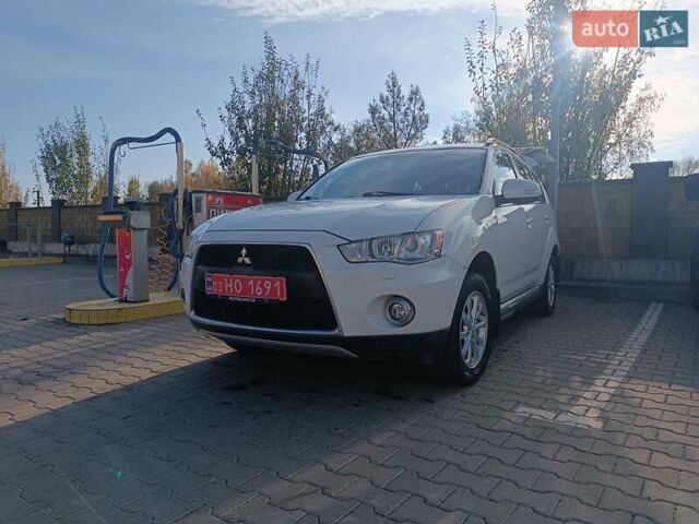 Белый Мицубиси Аутлендер ХЛ, объемом двигателя 2.2 л и пробегом 290 тыс. км за 10950 $, фото 42 на Automoto.ua