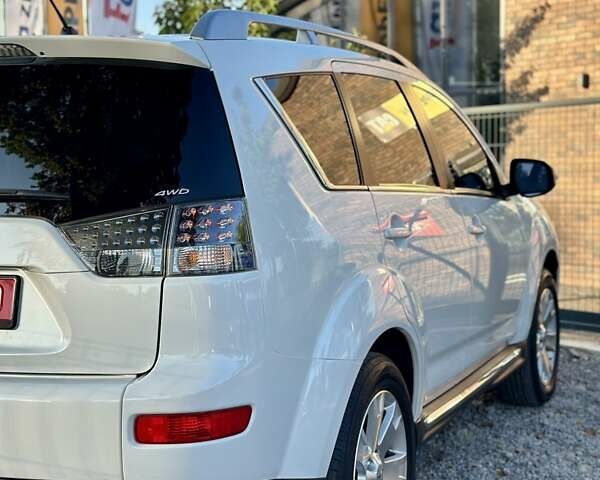 Мицубиси Аутлендер ХЛ 2011 в Виннице на Automoto.ua Белый Мицубиси Аутлендер ХЛ, объемом двигателя 2 л и пробегом 225 тыс. км за 10999 $, фото 14 на Automoto.ua