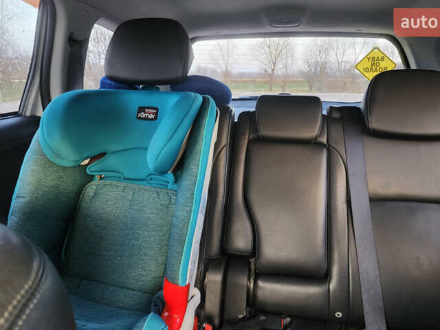 Білий Міцубісі Аутлендер ХЛ, об'ємом двигуна 2.36 л та пробігом 124 тис. км за 11300 $, фото 25 на Automoto.ua