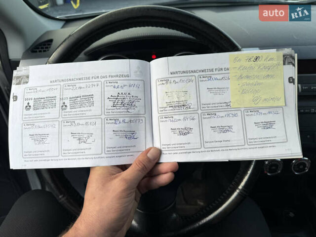 Білий Міцубісі Аутлендер ХЛ, об'ємом двигуна 2.3 л та пробігом 200 тис. км за 10999 $, фото 27 на Automoto.ua