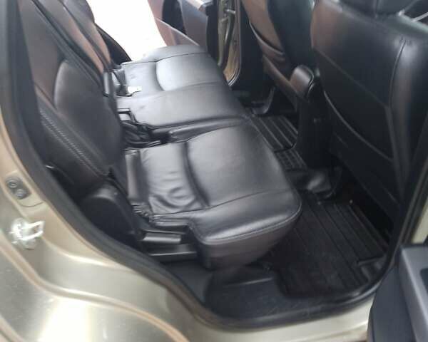 Міцубісі Аутлендер ХЛ 2007 у Трускавце на Automoto.ua Бежевий Міцубісі Аутлендер ХЛ, об'ємом двигуна 2.36 л та пробігом 202 тис. км за 8199 $, фото 10 на Automoto.ua