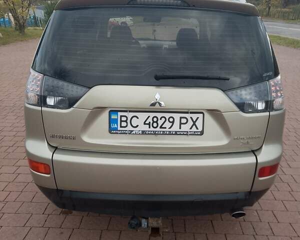 Міцубісі Аутлендер ХЛ 2007 у Трускавце на Automoto.ua Бежевий Міцубісі Аутлендер ХЛ, об'ємом двигуна 2.36 л та пробігом 202 тис. км за 8199 $, фото 12 на Automoto.ua