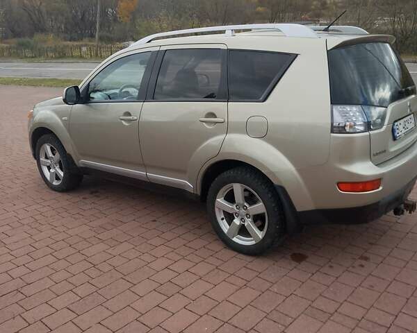 Міцубісі Аутлендер ХЛ 2007 у Трускавце на Automoto.ua Бежевий Міцубісі Аутлендер ХЛ, об'ємом двигуна 2.36 л та пробігом 202 тис. км за 8199 $, фото 18 на Automoto.ua