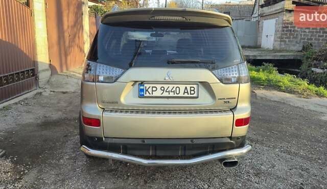 Бежевый Мицубиси Аутлендер ХЛ, объемом двигателя 3 л и пробегом 295 тыс. км за 9600 $, фото 11 на Automoto.ua