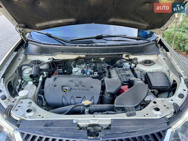 Бежевый Мицубиси Аутлендер ХЛ, объемом двигателя 2 л и пробегом 226 тыс. км за 8999 $, фото 42 на Automoto.ua