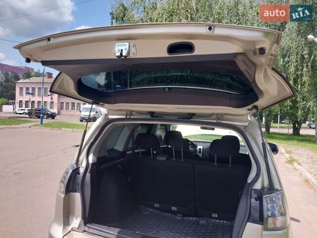 Бежевый Мицубиси Аутлендер ХЛ, объемом двигателя 2.4 л и пробегом 275 тыс. км за 8600 $, фото 38 на Automoto.ua