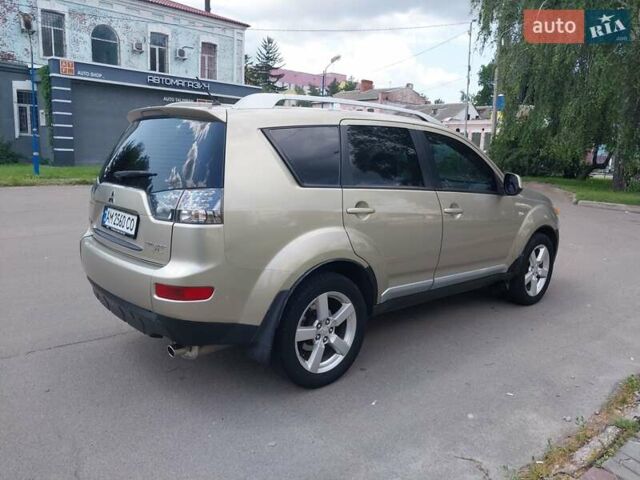 Бежевый Мицубиси Аутлендер ХЛ, объемом двигателя 2.4 л и пробегом 275 тыс. км за 8600 $, фото 4 на Automoto.ua