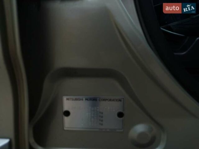 Бежевый Мицубиси Аутлендер ХЛ, объемом двигателя 2.4 л и пробегом 275 тыс. км за 8600 $, фото 30 на Automoto.ua