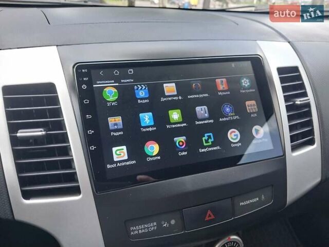 Бежевый Мицубиси Аутлендер ХЛ, объемом двигателя 2.4 л и пробегом 275 тыс. км за 8600 $, фото 39 на Automoto.ua