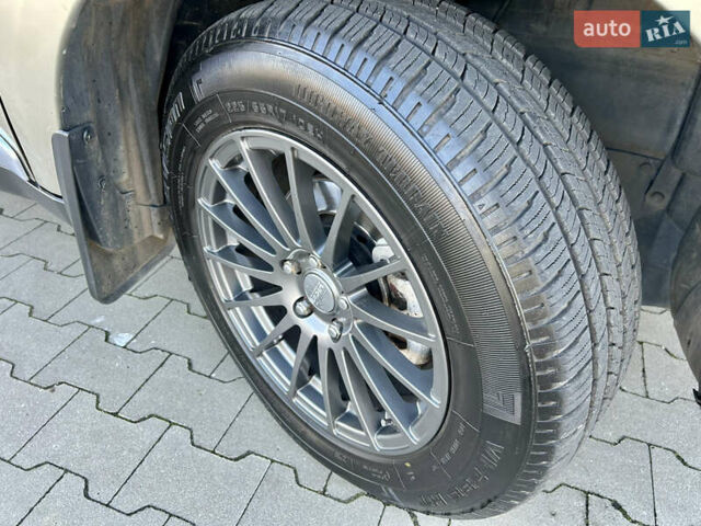 Бежевый Мицубиси Аутлендер ХЛ, объемом двигателя 2 л и пробегом 226 тыс. км за 8999 $, фото 41 на Automoto.ua