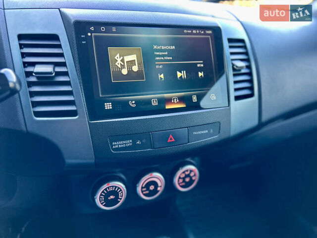 Бежевый Мицубиси Аутлендер ХЛ, объемом двигателя 2 л и пробегом 226 тыс. км за 8999 $, фото 46 на Automoto.ua