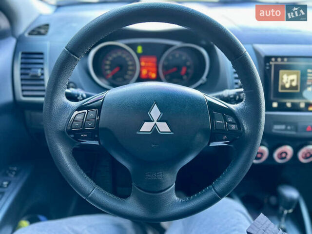 Бежевый Мицубиси Аутлендер ХЛ, объемом двигателя 2 л и пробегом 226 тыс. км за 8999 $, фото 45 на Automoto.ua