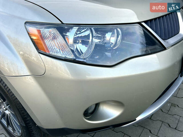 Бежевый Мицубиси Аутлендер ХЛ, объемом двигателя 2 л и пробегом 226 тыс. км за 8999 $, фото 9 на Automoto.ua