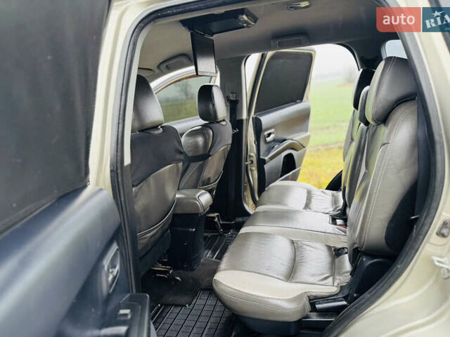 Бежевый Мицубиси Аутлендер ХЛ, объемом двигателя 2.4 л и пробегом 107 тыс. км за 9900 $, фото 13 на Automoto.ua