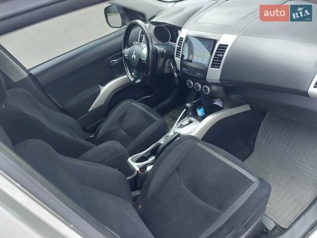 Бежевый Мицубиси Аутлендер ХЛ, объемом двигателя 2.4 л и пробегом 275 тыс. км за 8600 $, фото 33 на Automoto.ua