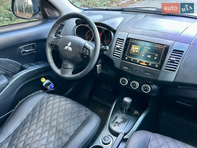 Бежевый Мицубиси Аутлендер ХЛ, объемом двигателя 2 л и пробегом 226 тыс. км за 8999 $, фото 25 на Automoto.ua