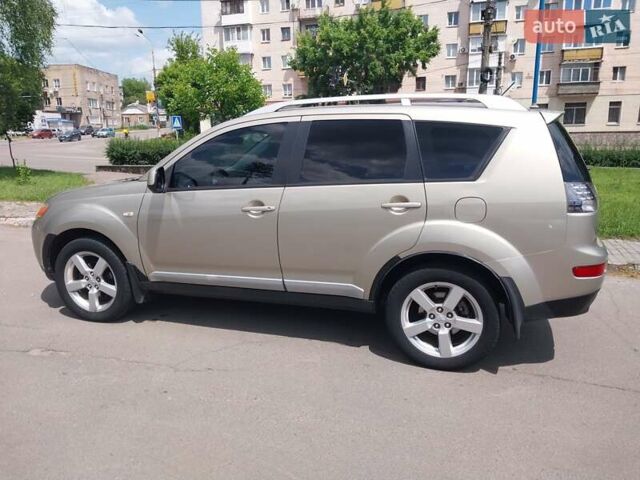 Бежевый Мицубиси Аутлендер ХЛ, объемом двигателя 2.4 л и пробегом 275 тыс. км за 8600 $, фото 11 на Automoto.ua
