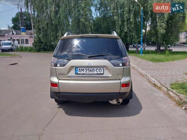 Бежевый Мицубиси Аутлендер ХЛ, объемом двигателя 2.4 л и пробегом 275 тыс. км за 8600 $, фото 6 на Automoto.ua