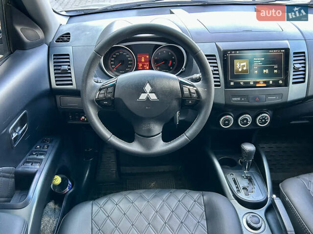 Бежевый Мицубиси Аутлендер ХЛ, объемом двигателя 2 л и пробегом 226 тыс. км за 8999 $, фото 21 на Automoto.ua