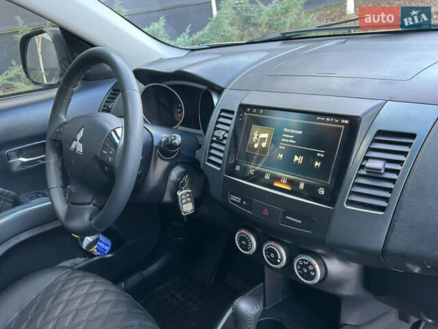 Бежевый Мицубиси Аутлендер ХЛ, объемом двигателя 2 л и пробегом 226 тыс. км за 8999 $, фото 30 на Automoto.ua