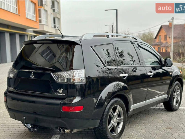 Чорний Міцубісі Аутлендер ХЛ, об'ємом двигуна 2 л та пробігом 222 тис. км за 10300 $, фото 6 на Automoto.ua