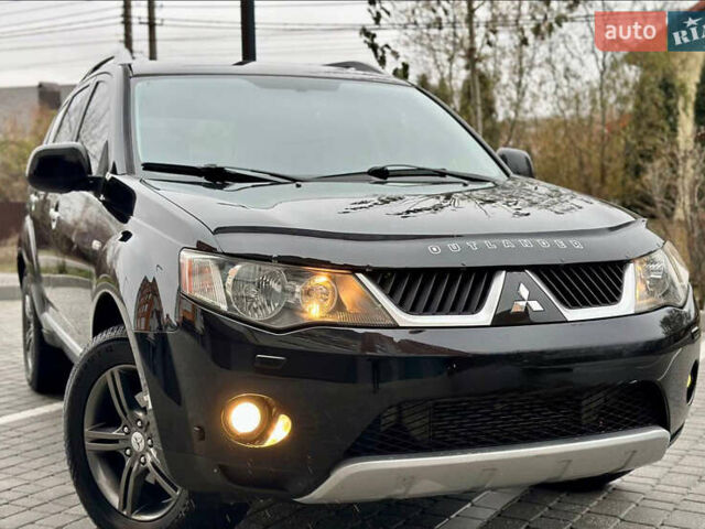 Чорний Міцубісі Аутлендер ХЛ, об'ємом двигуна 2 л та пробігом 222 тис. км за 10300 $, фото 1 на Automoto.ua