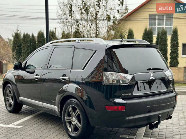 Чорний Міцубісі Аутлендер ХЛ, об'ємом двигуна 2 л та пробігом 222 тис. км за 10300 $, фото 4 на Automoto.ua