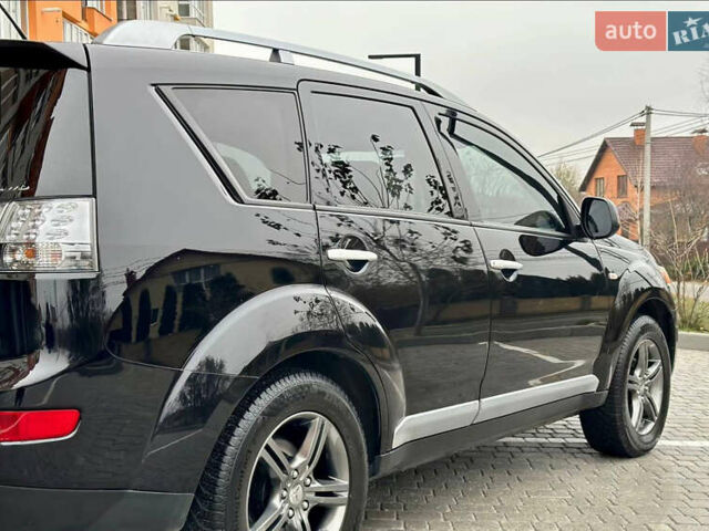 Чорний Міцубісі Аутлендер ХЛ, об'ємом двигуна 2 л та пробігом 222 тис. км за 10300 $, фото 3 на Automoto.ua