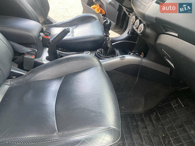 Черный Мицубиси Аутлендер ХЛ, объемом двигателя 1.97 л и пробегом 207 тыс. км за 8200 $, фото 17 на Automoto.ua