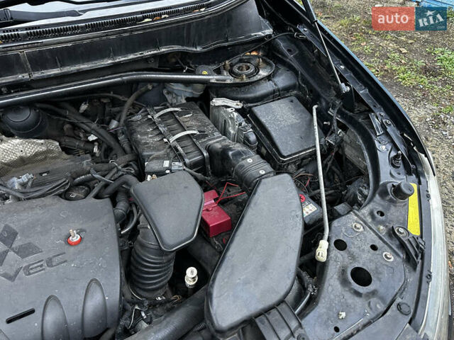 Чорний Міцубісі Аутлендер ХЛ, об'ємом двигуна 2.4 л та пробігом 283 тис. км за 8900 $, фото 31 на Automoto.ua