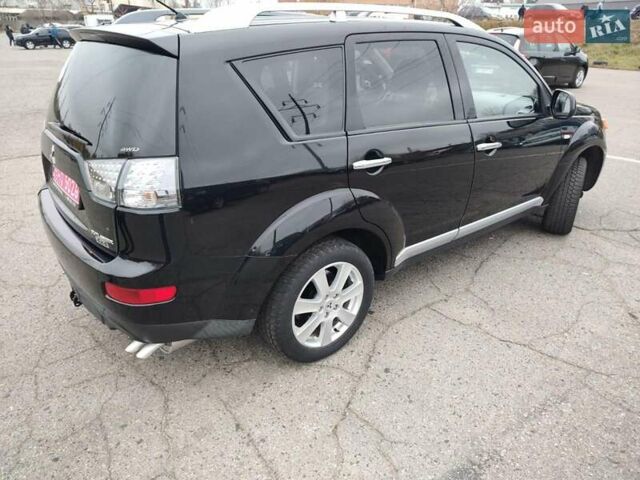 Черный Мицубиси Аутлендер ХЛ, объемом двигателя 2 л и пробегом 218 тыс. км за 10500 $, фото 10 на Automoto.ua