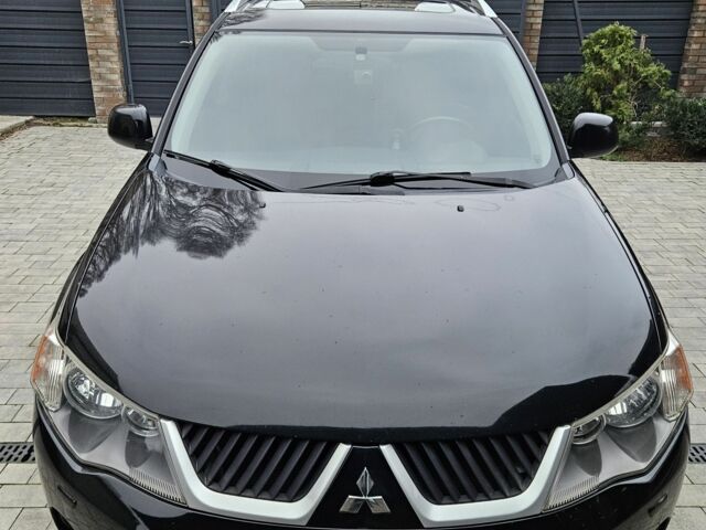 Чорний Міцубісі Аутлендер ХЛ, об'ємом двигуна 3 л та пробігом 238 тис. км за 10800 $, фото 7 на Automoto.ua