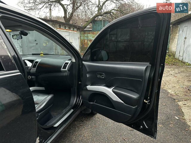 Черный Мицубиси Аутлендер ХЛ, объемом двигателя 2.4 л и пробегом 283 тыс. км за 8900 $, фото 13 на Automoto.ua