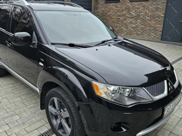 Чорний Міцубісі Аутлендер ХЛ, об'ємом двигуна 3 л та пробігом 238 тис. км за 10800 $, фото 11 на Automoto.ua