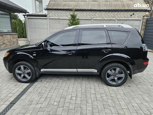Чорний Міцубісі Аутлендер ХЛ, об'ємом двигуна 3 л та пробігом 238 тис. км за 10800 $, фото 2 на Automoto.ua