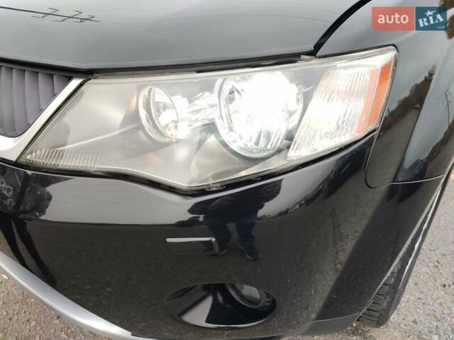 Черный Мицубиси Аутлендер ХЛ, объемом двигателя 2 л и пробегом 218 тыс. км за 10500 $, фото 14 на Automoto.ua