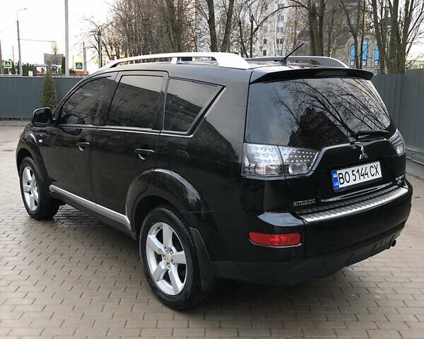 Черный Мицубиси Аутлендер ХЛ, объемом двигателя 3 л и пробегом 207 тыс. км за 9300 $, фото 12 на Automoto.ua
