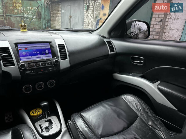 Черный Мицубиси Аутлендер ХЛ, объемом двигателя 2.4 л и пробегом 283 тыс. км за 8900 $, фото 22 на Automoto.ua