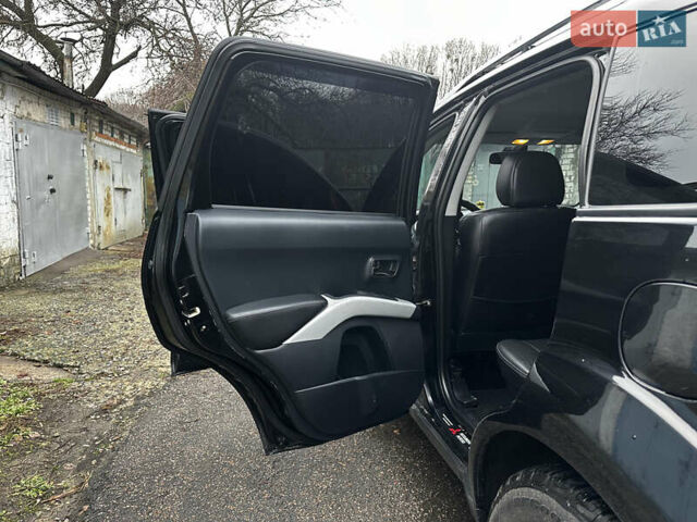 Чорний Міцубісі Аутлендер ХЛ, об'ємом двигуна 2.4 л та пробігом 283 тис. км за 8900 $, фото 11 на Automoto.ua