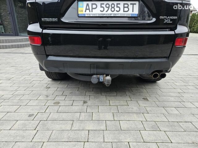 Чорний Міцубісі Аутлендер ХЛ, об'ємом двигуна 3 л та пробігом 238 тис. км за 10800 $, фото 8 на Automoto.ua