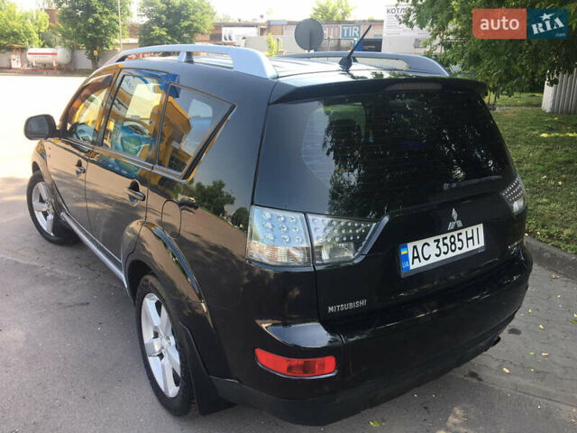 Черный Мицубиси Аутлендер ХЛ, объемом двигателя 3 л и пробегом 273 тыс. км за 9999 $, фото 7 на Automoto.ua